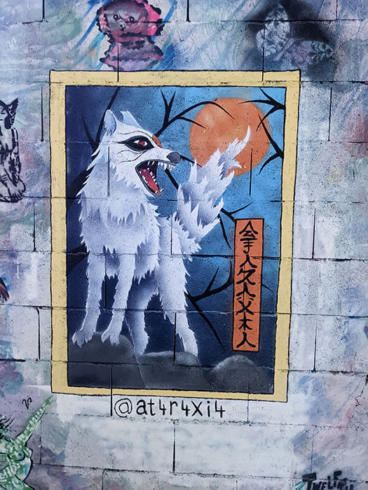 Voyages-Deci-Dela-Spot-13-Paris-graffiti-street-art-loup-estampe-sur-mur