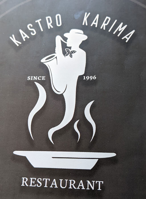 Voyages-Deci-Dela-restaurant-Kastro-Karima-menu-logo